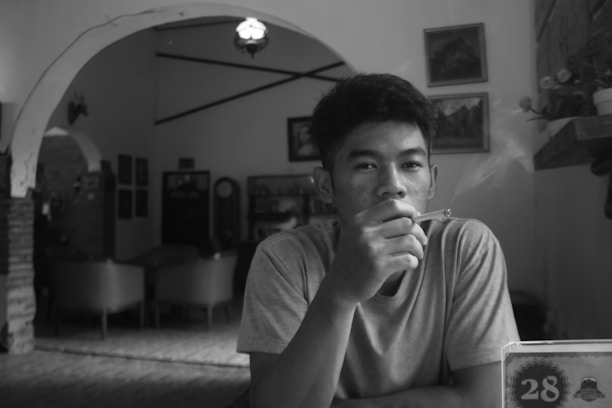 A compassionate counselor guiding a smoker through harm reduction options in a cozy, welcoming setting.