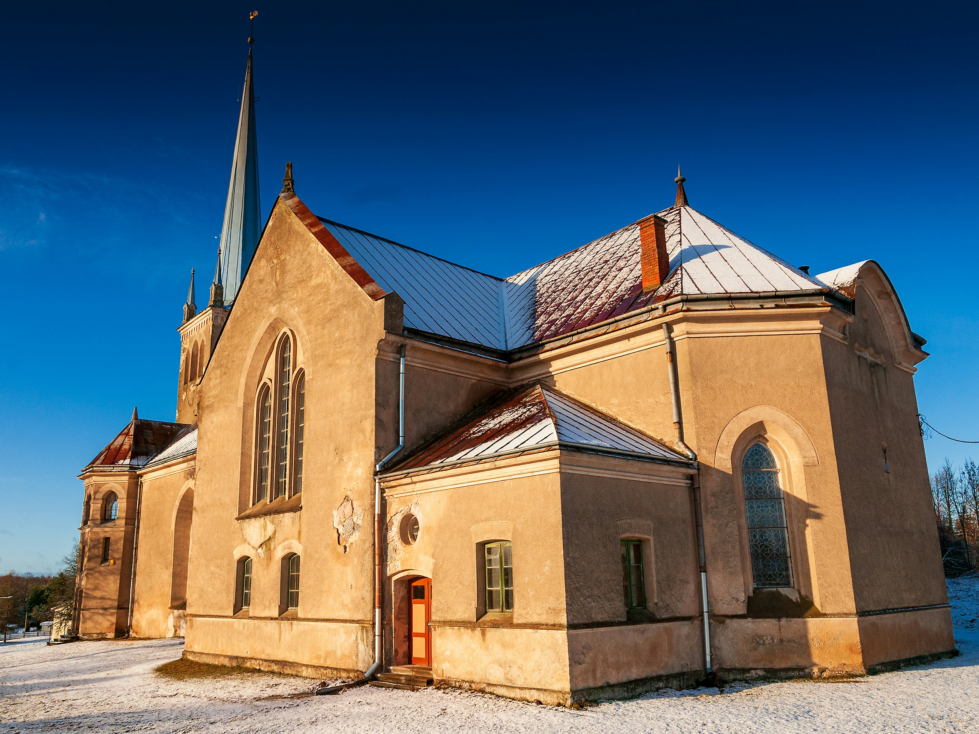 a church with a steeple and a steeple on top of it