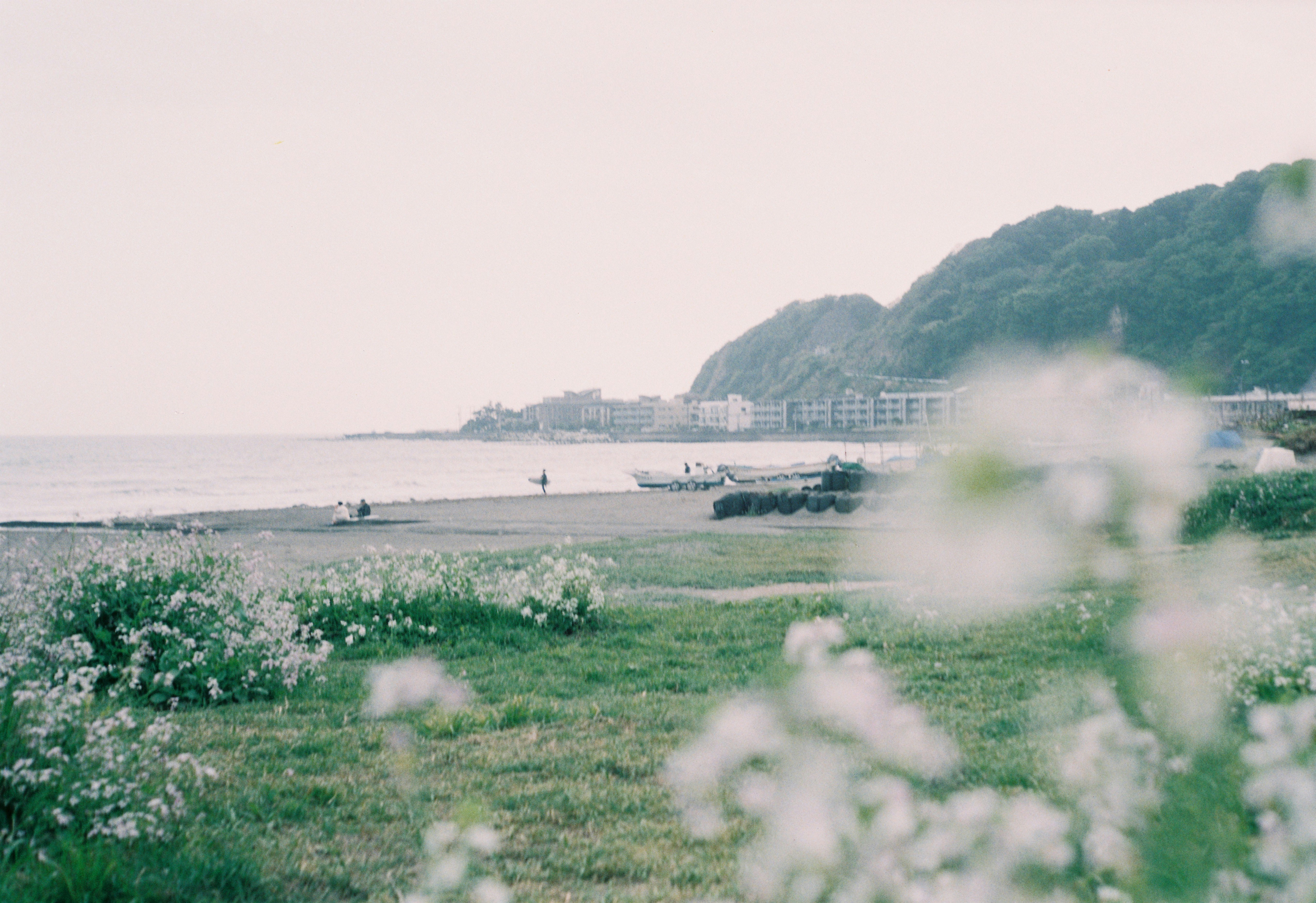 a view of a beach with boats in the water