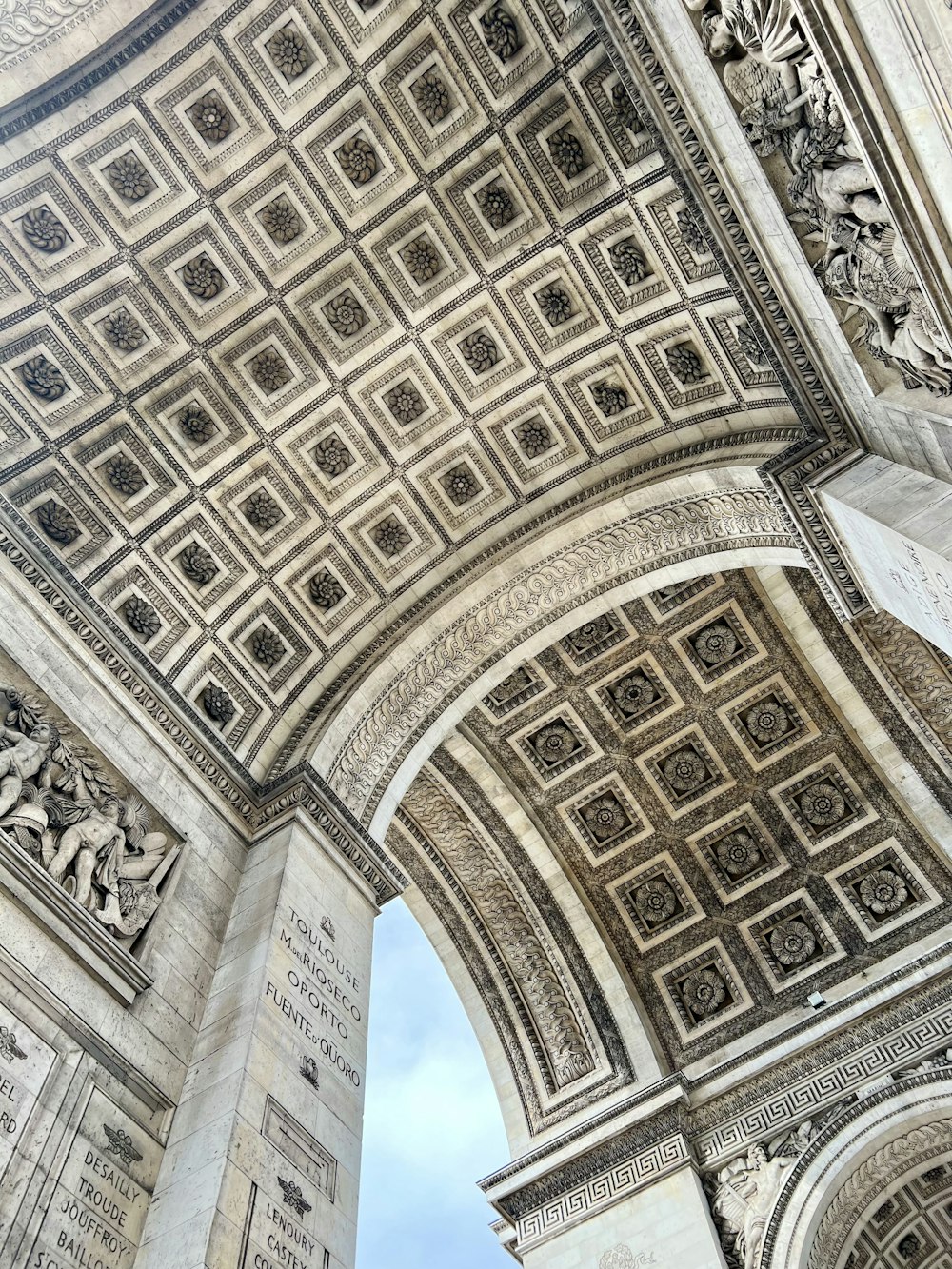 a close up of a very tall building with a sky background