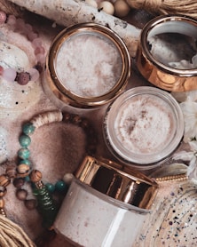 a table topped with jars filled with different types of items