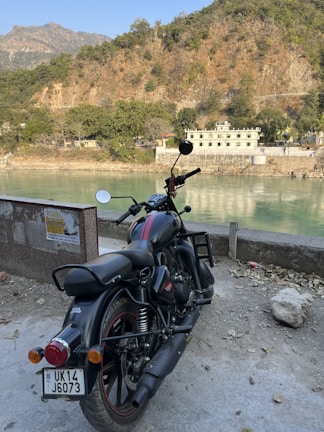 A scenic view of a bike parked near a river.