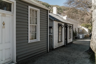 Historic German architecture lining a quiet street in Qingdao.