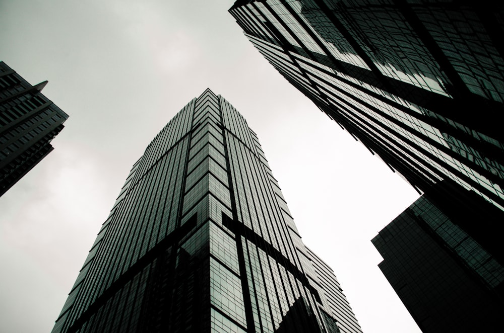 a group of tall buildings towering up into the sky