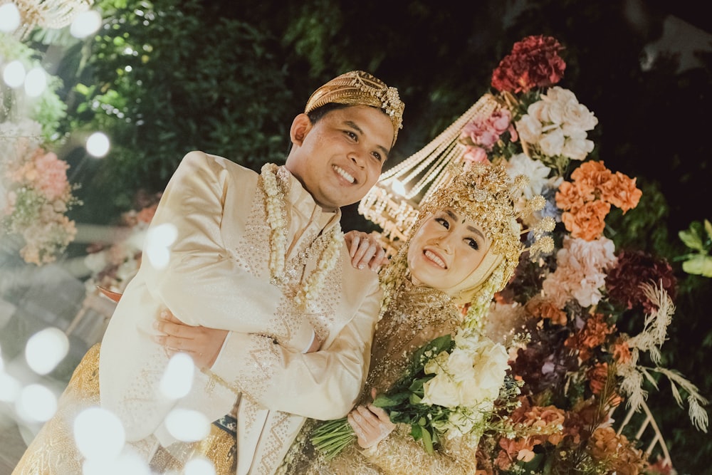 a man and a woman standing next to each other