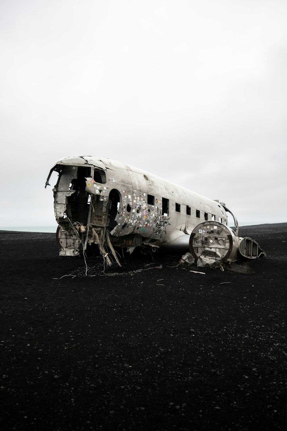 a plane that is sitting in the dirt