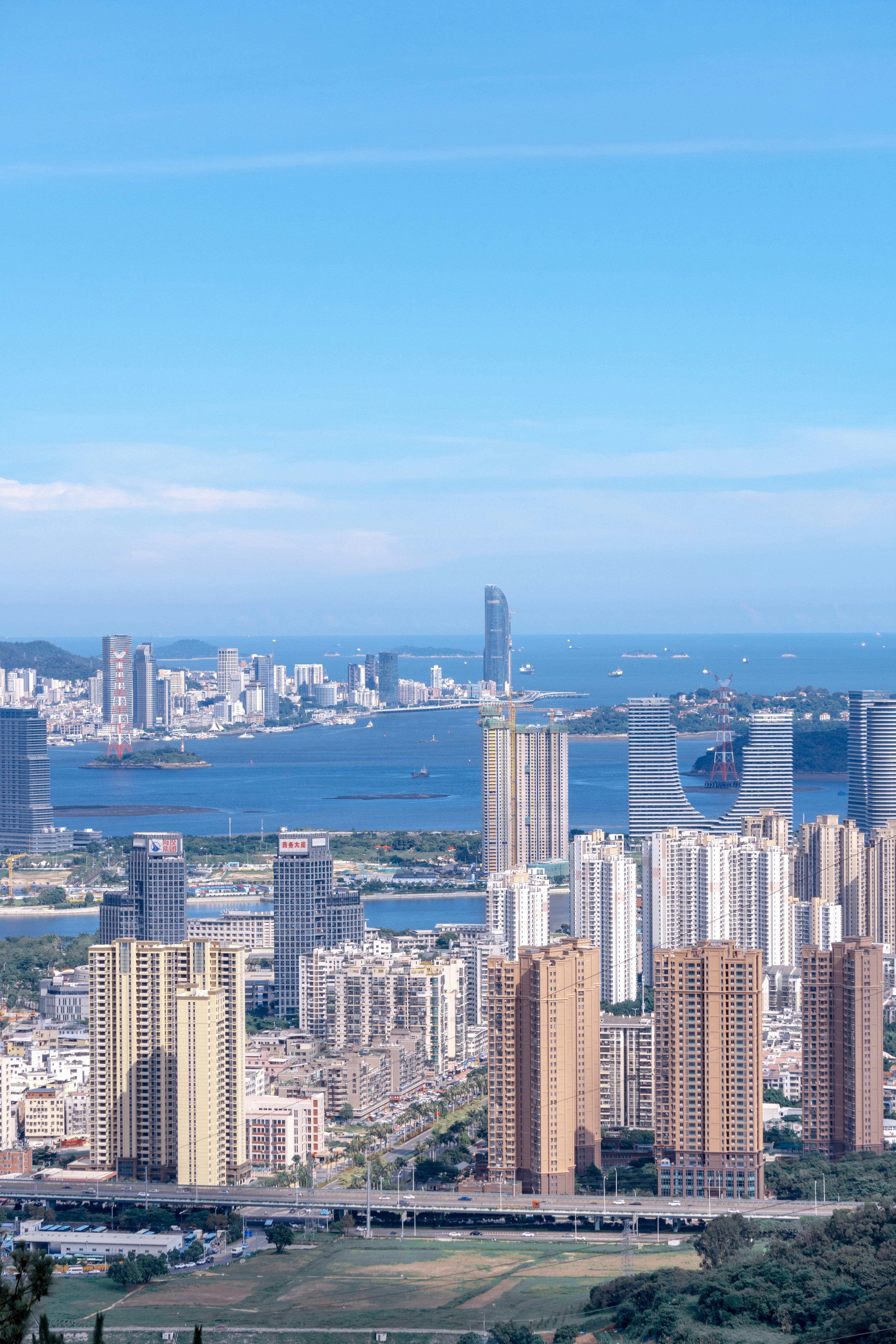 a view of a city from a hill