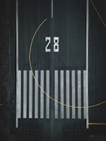 Close-up of fresh road and airport runway markings painted with precision.