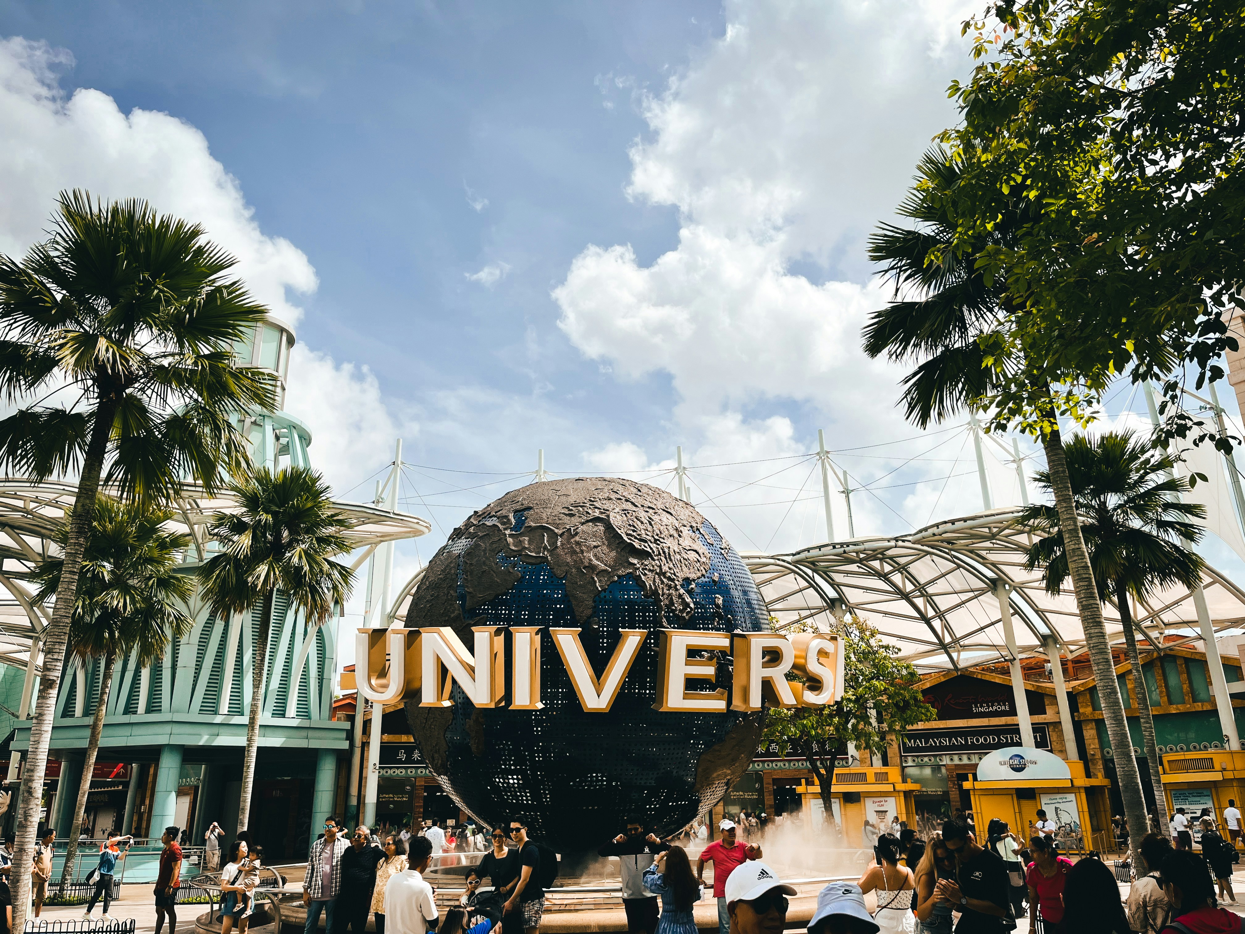 A group of people standing in front of a building photo – Free Sentosa ...
