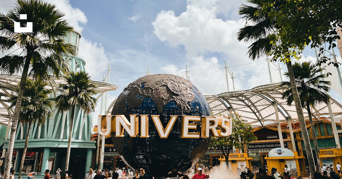 A group of people standing in front of a building photo – Free Sentosa ...