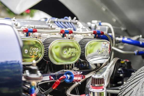 A detailed shot of various filters and lubricants included in a maintenance set, highlighting textures and labels.