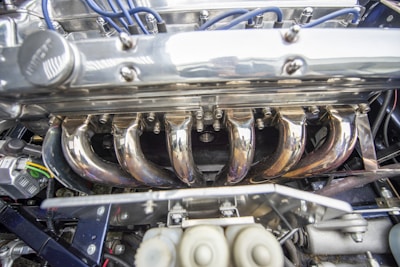 Close-up of a shiny car engine component with detailed textures