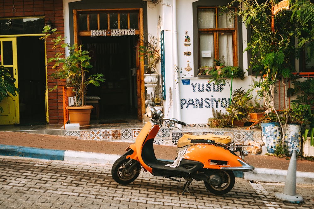 a scooter parked on the side of the road