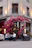 A couple dining outdoors at a vibrant Spanish restaurant in Barcelona.