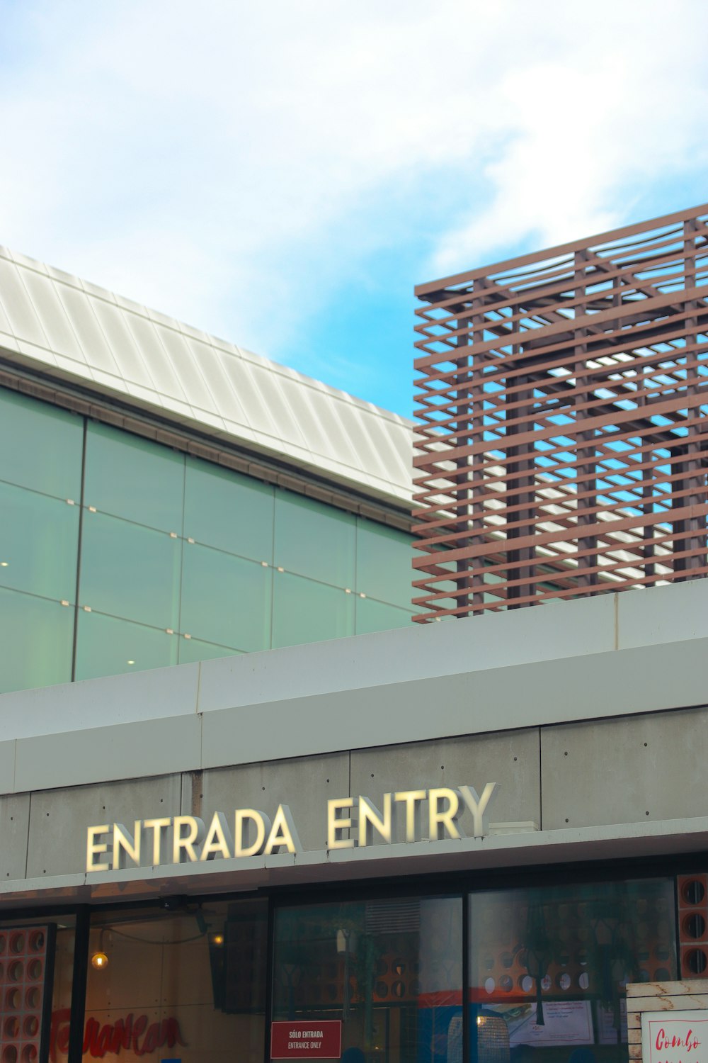 a building with a sign that says entrada entry