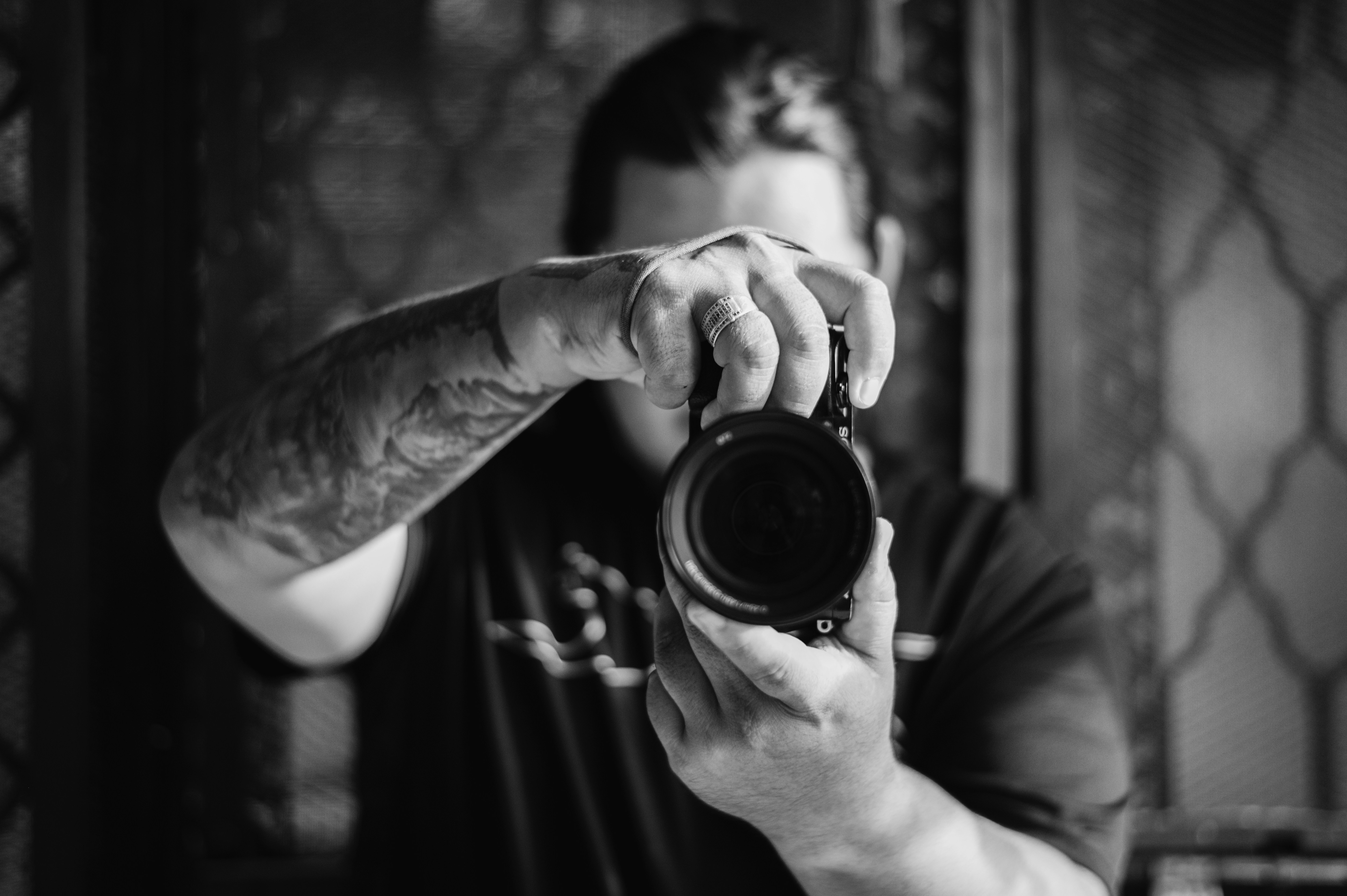 a man taking a picture of himself with a camera