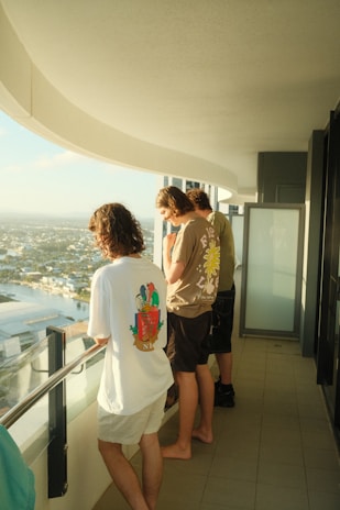 A family enjoying time in a spacious 3BHK balcony.