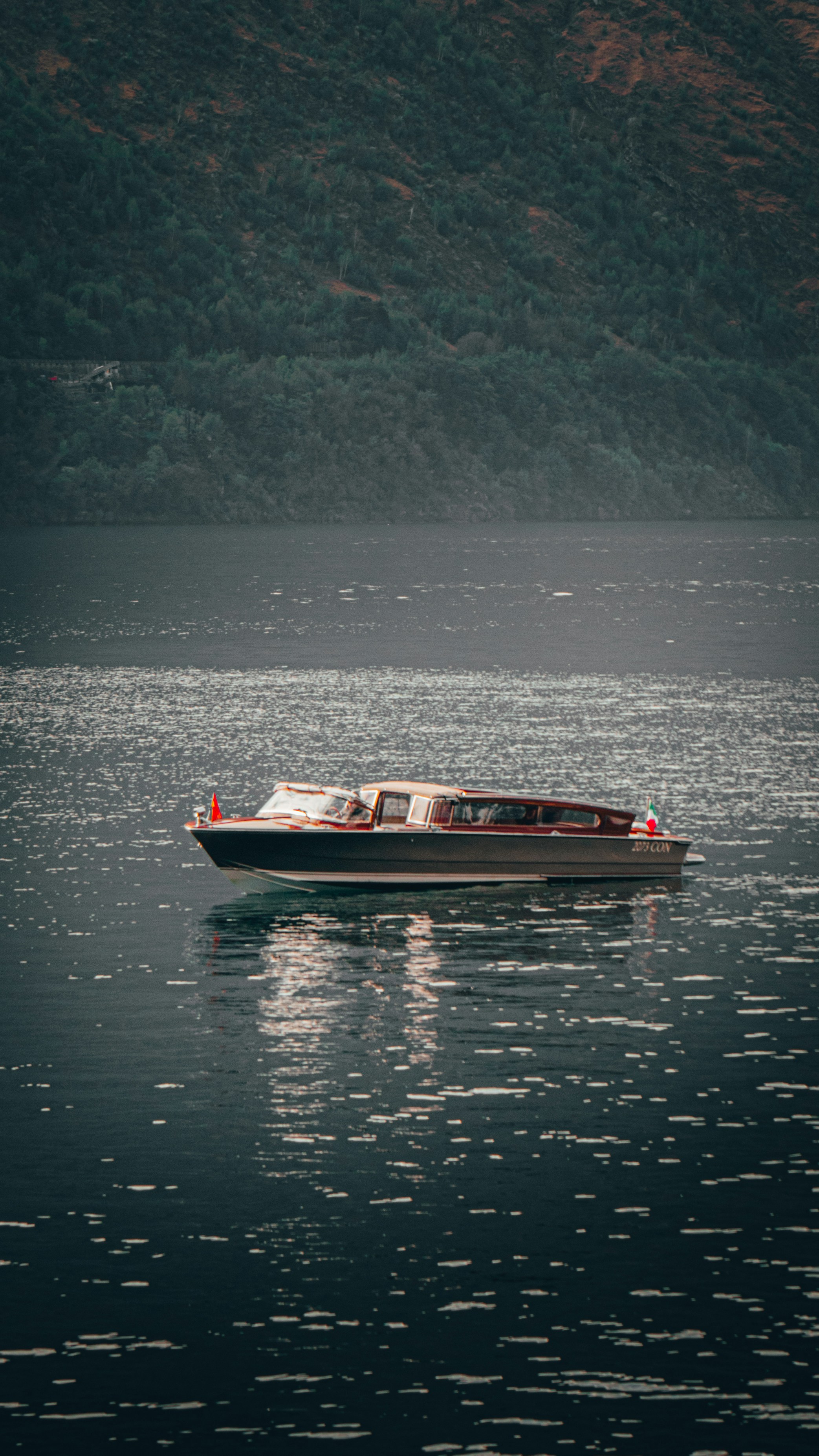 A sleek Venetian water taxi on Lake Como.