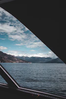 A scenic view through crystal-clear windows overlooking Lake Geneva.