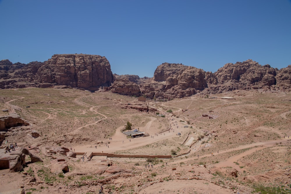 a dirt road in the middle of a desert