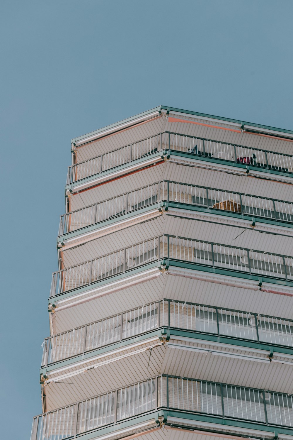 a very tall building with a clock on it's side