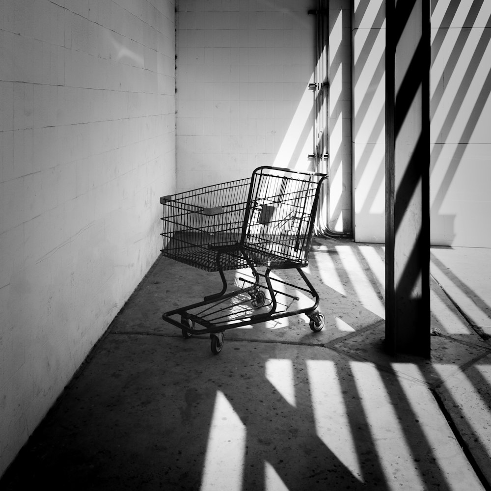 a black and white photo of a shopping cart