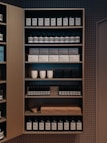A neatly organized shelf featuring various wellness and personal care products.