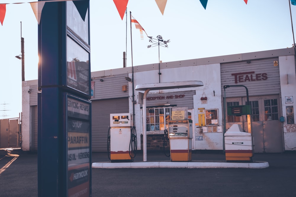 a gas station with a gas pump in front of it