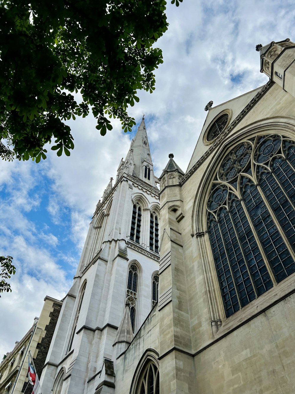 a tall cathedral with a sky background