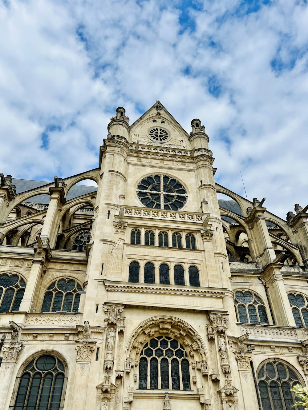 a large building with a clock on the front of it