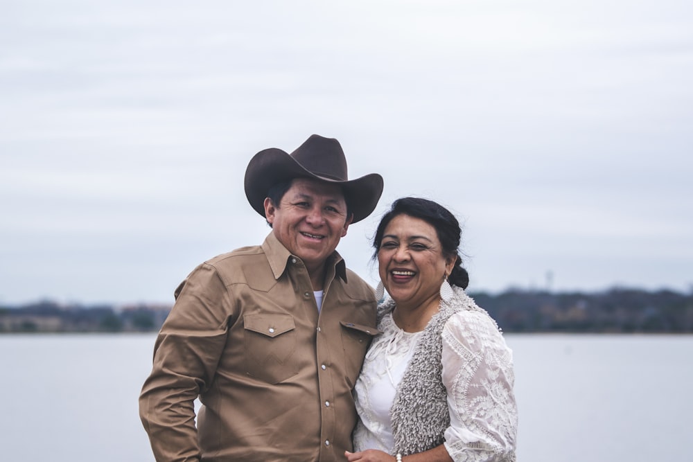 a man and a woman standing next to each other