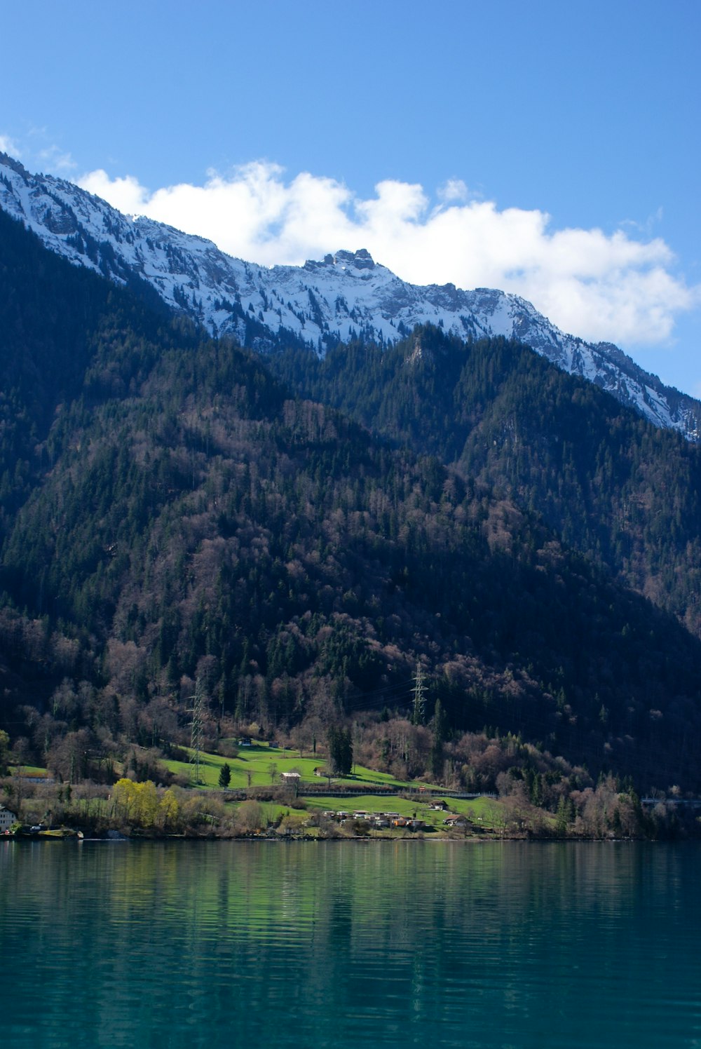 a lake with a mountain in the background