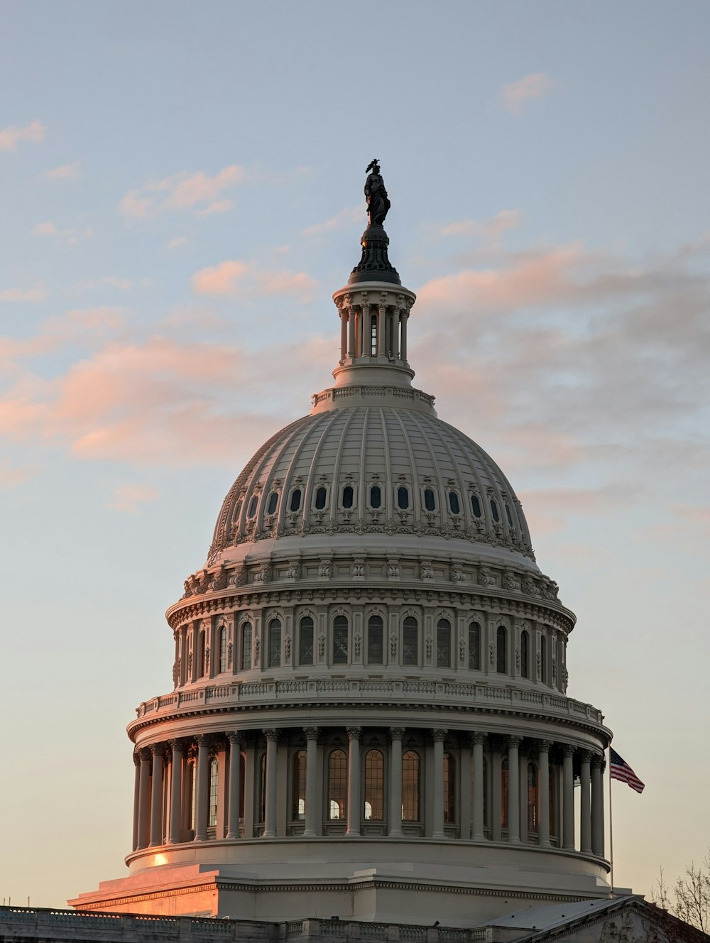 the dome of the u s capitol building at sunset