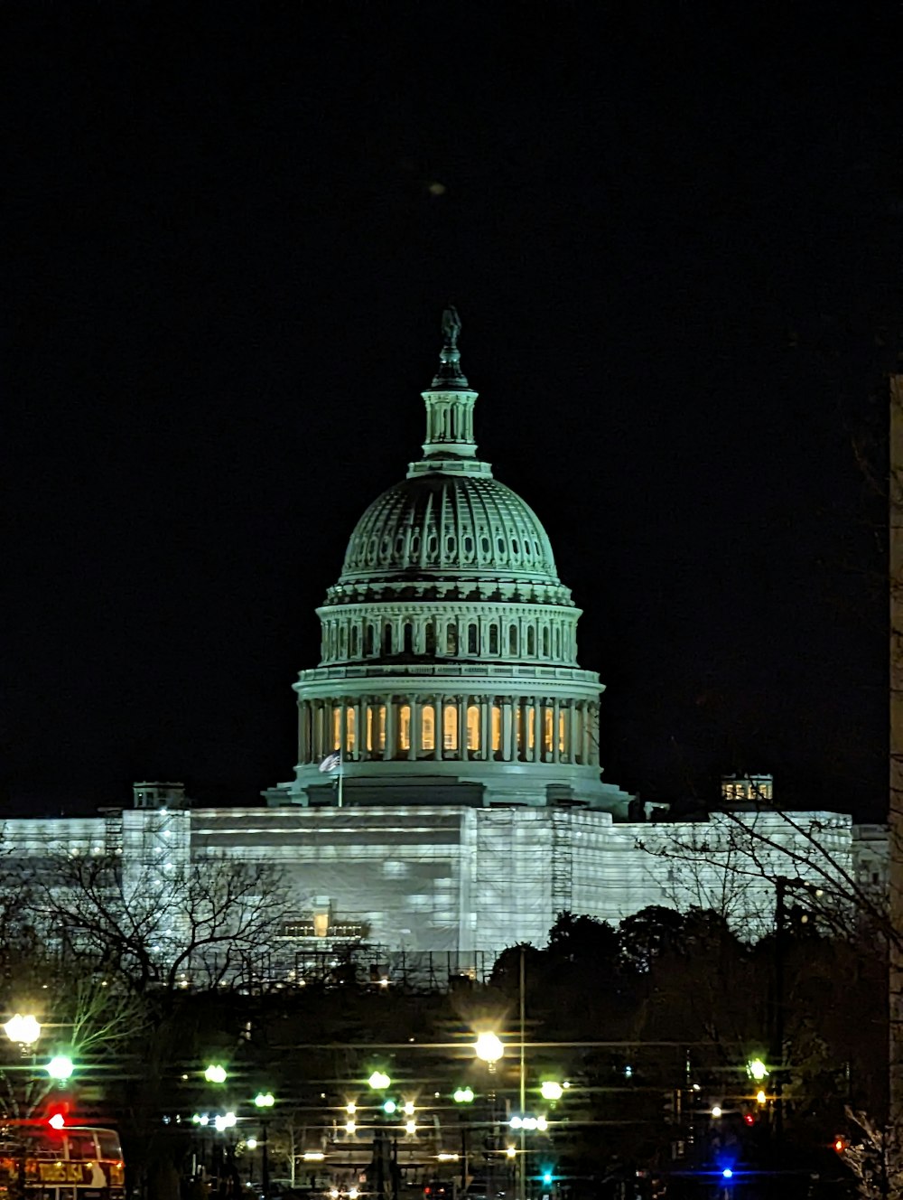 the capital building is lit up at night