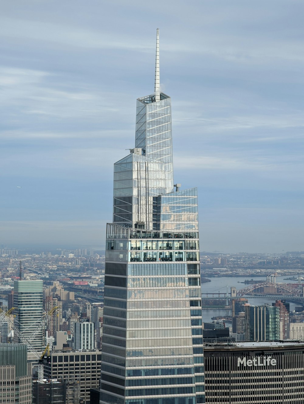 a view of a very tall building in a big city