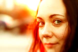 Soft-focus image of glowing skin with natural light highlighting a fresh, dewy look.