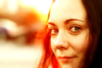 Soft-focus shot of eyes with warm, neutral eyeshadow and delicately blended lashes.