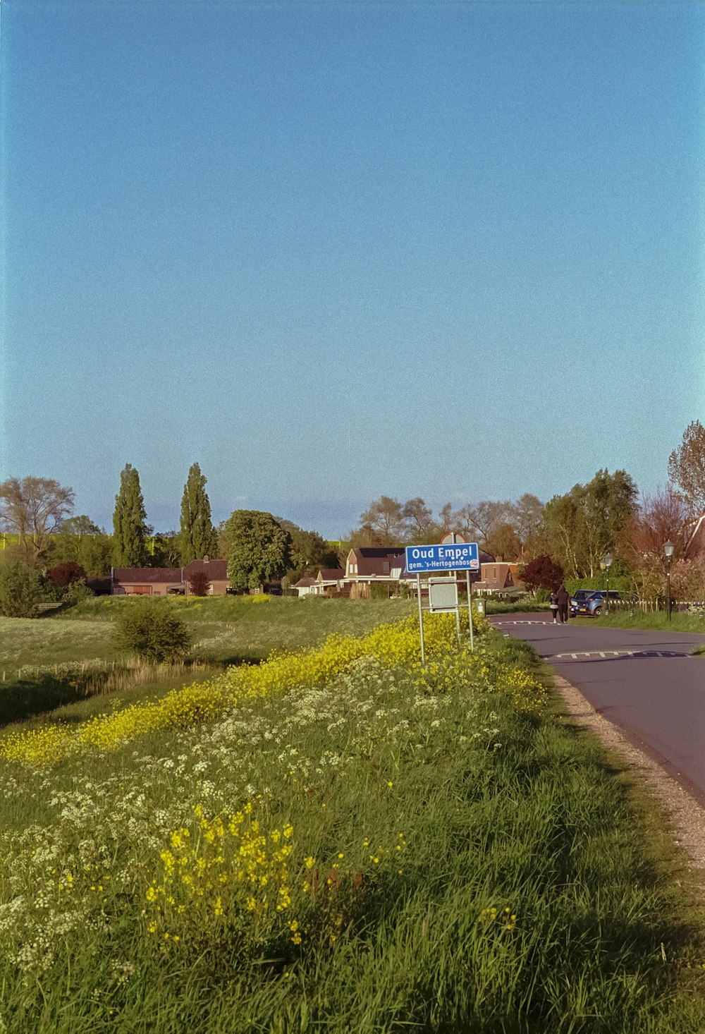 a road with a sign on the side of it