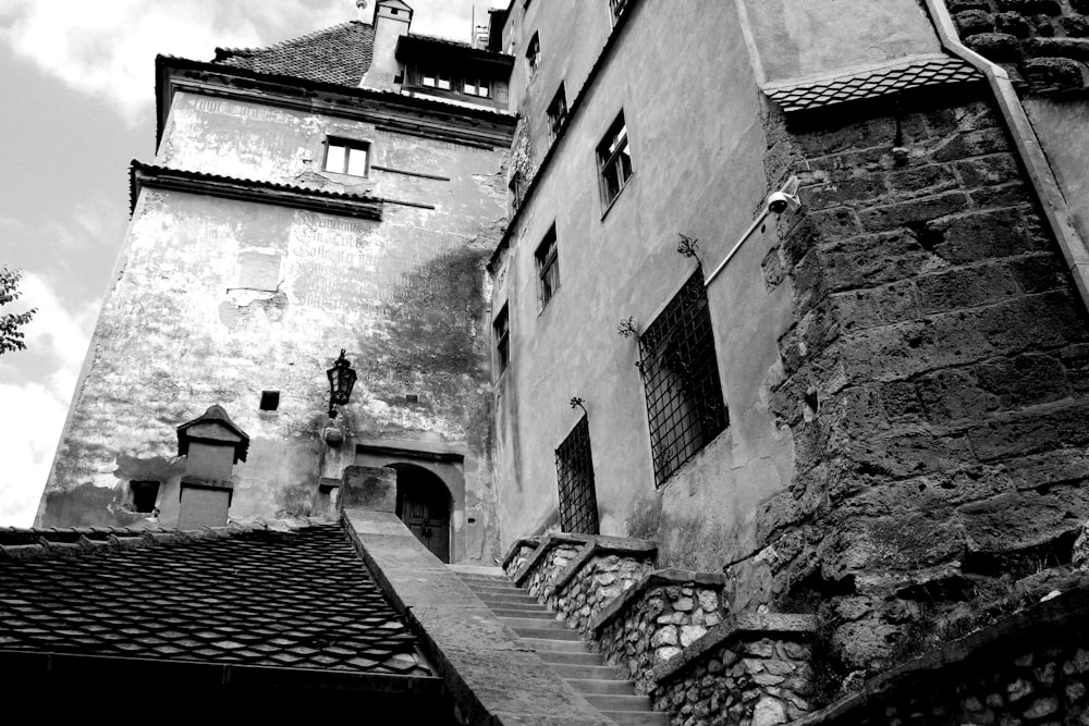 a black and white photo of a stone building