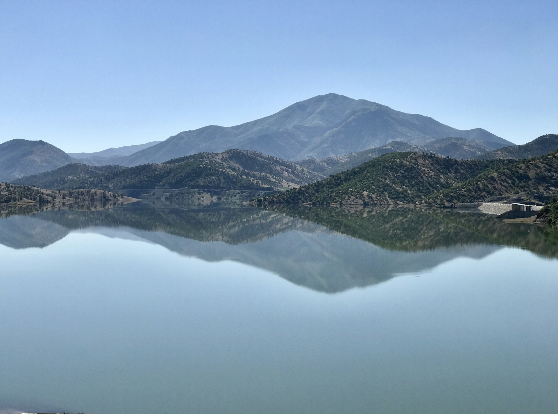 a large body of water surrounded by mountains