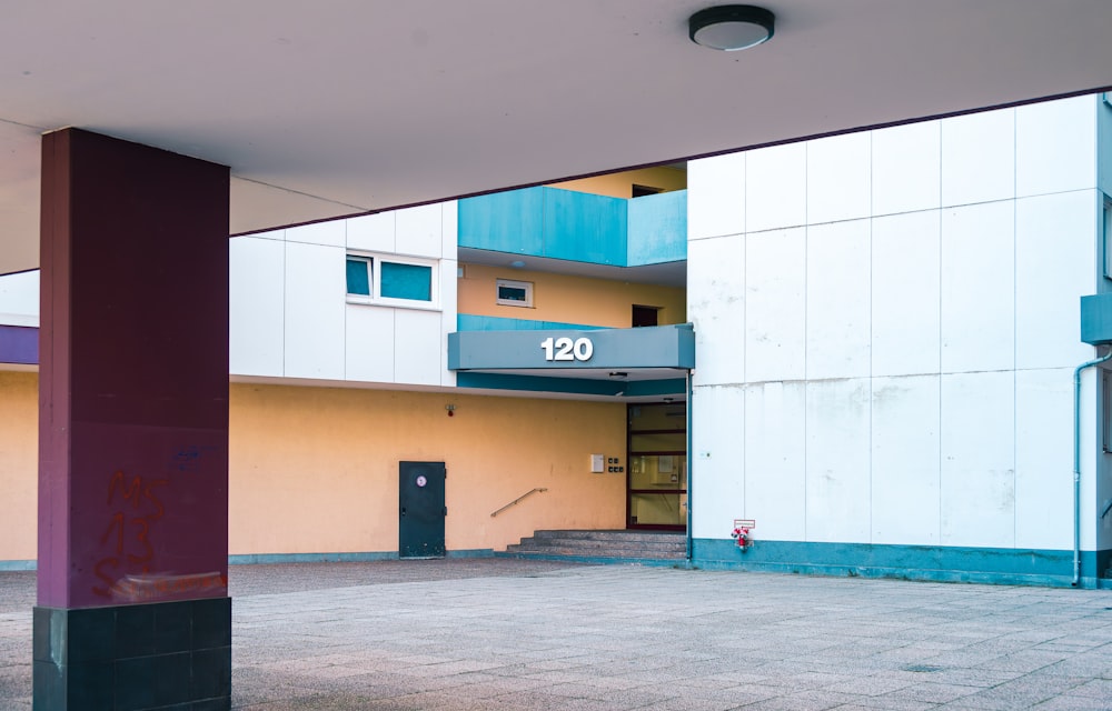 an empty parking lot in front of a building