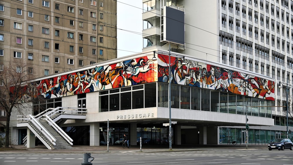 a large building with a mural on the side of it