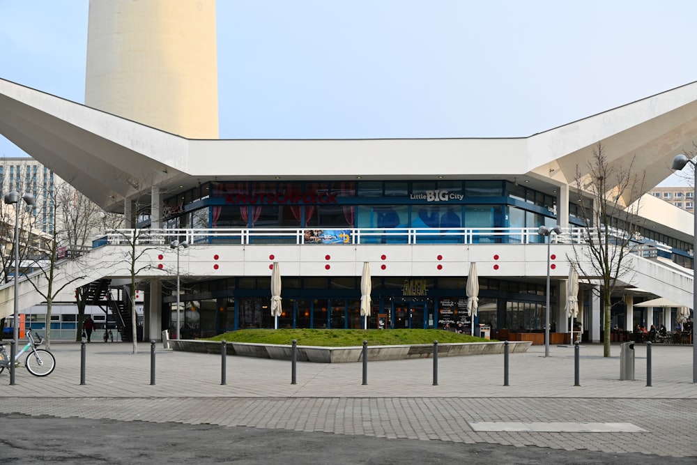 a large building with a bike parked in front of it