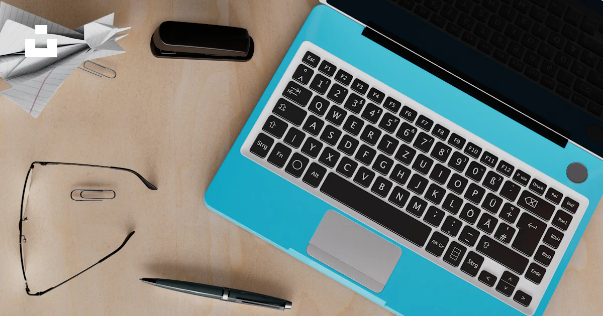 A laptop computer sitting on top of a wooden desk photo – Free ...
