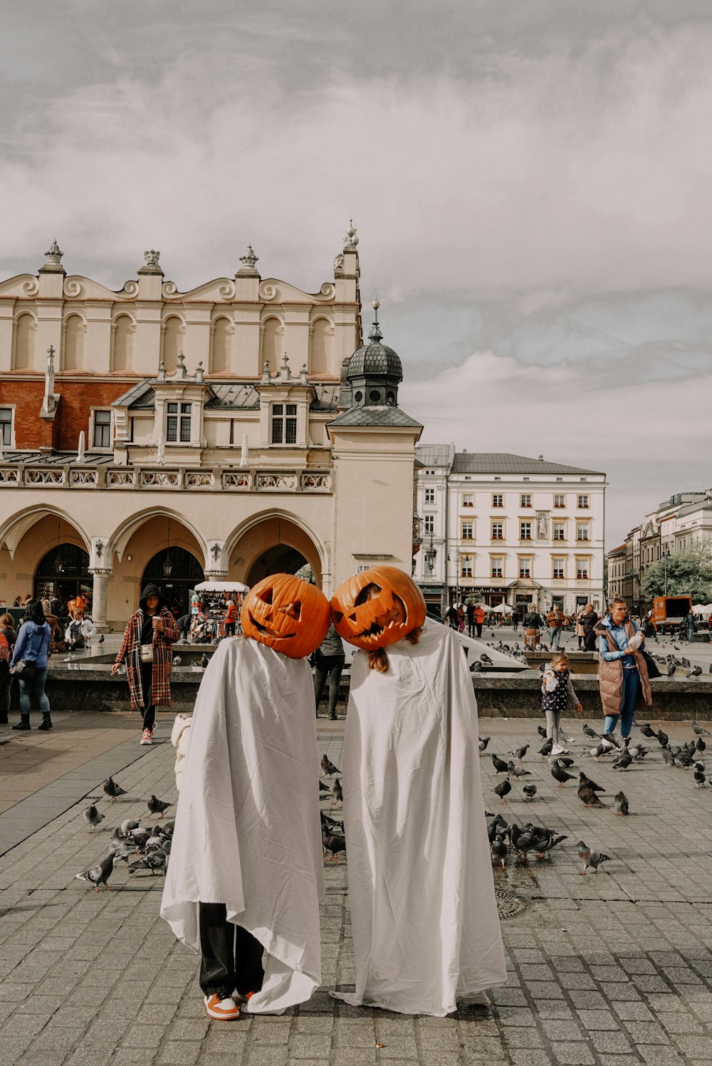 a couple of people that are standing in the street