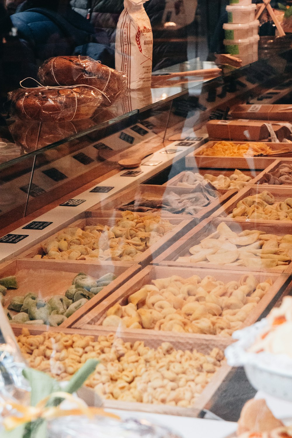 a display case filled with lots of different types of food