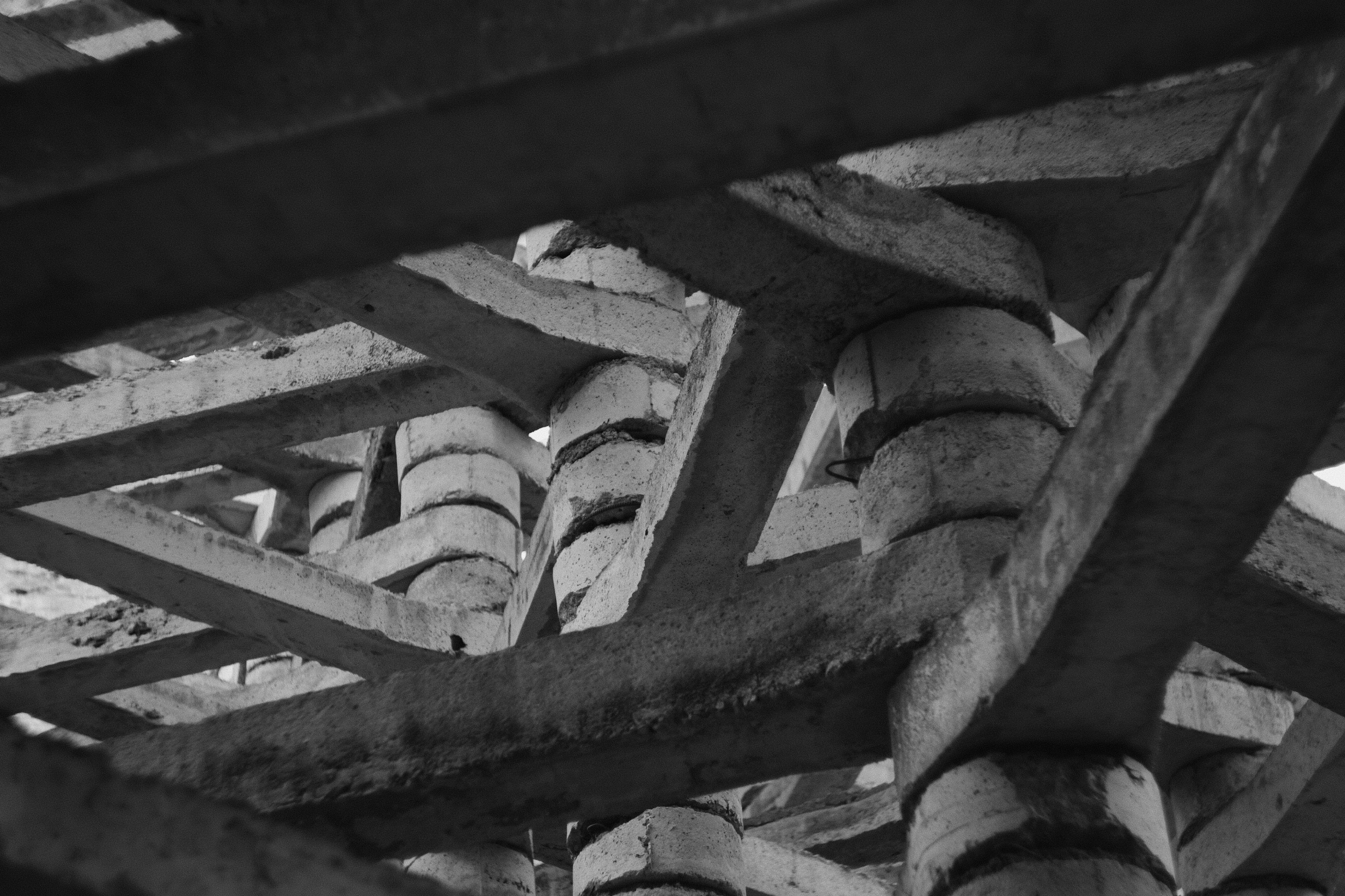 a black and white photo of a wooden structure