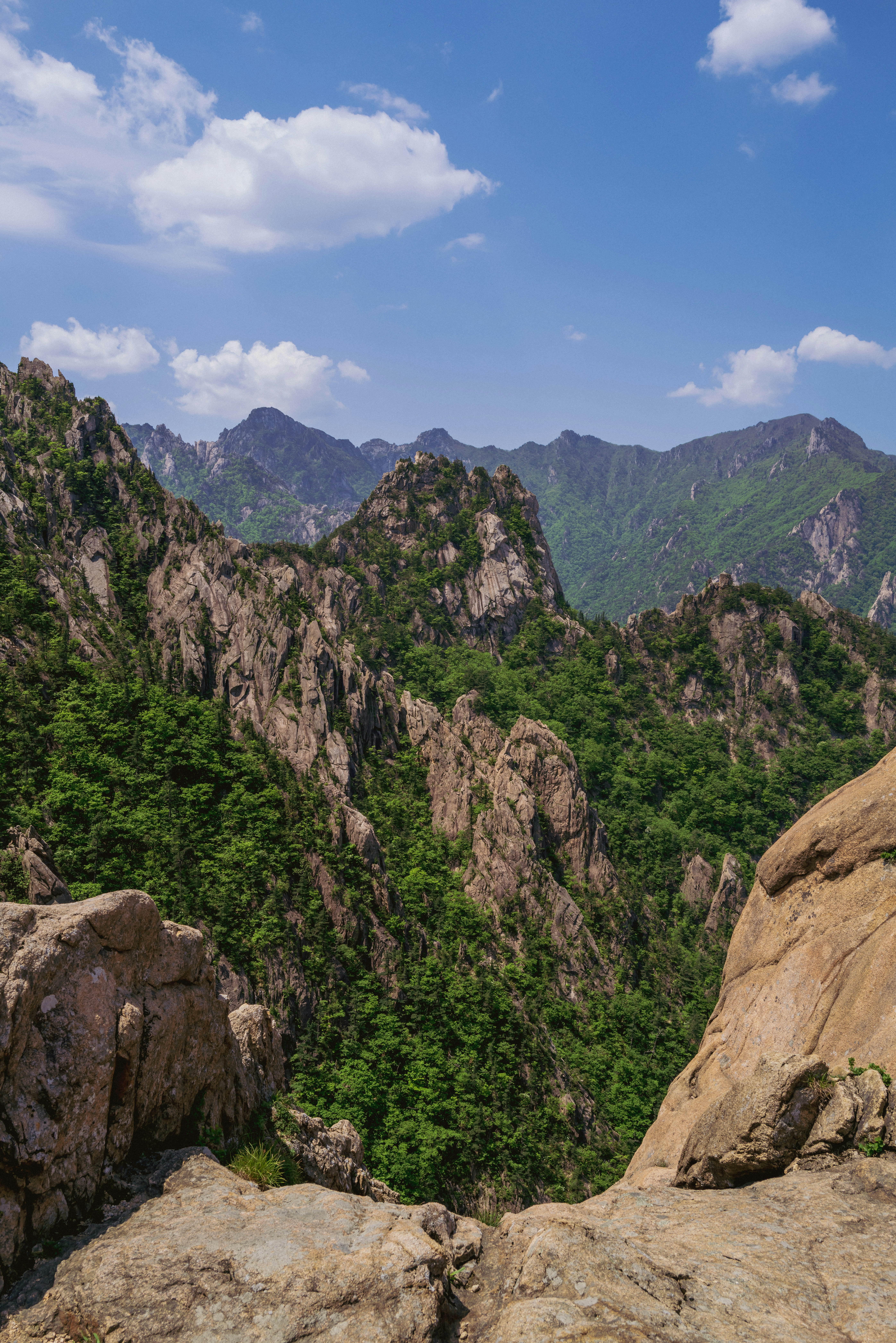a view of a mountain range from a high point of view