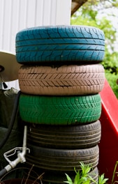 a pile of tires stacked on top of each other