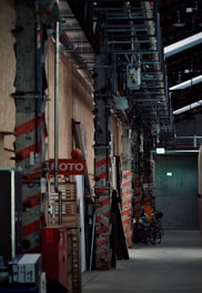a building with a lot of red and white signs on the side of it
